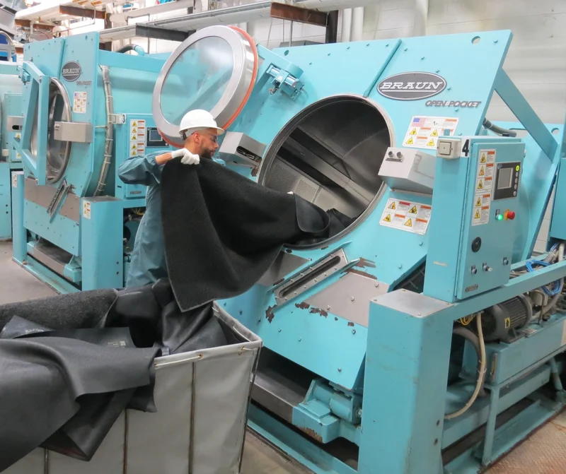 Industrial washer deep cleaning commercial floor mats